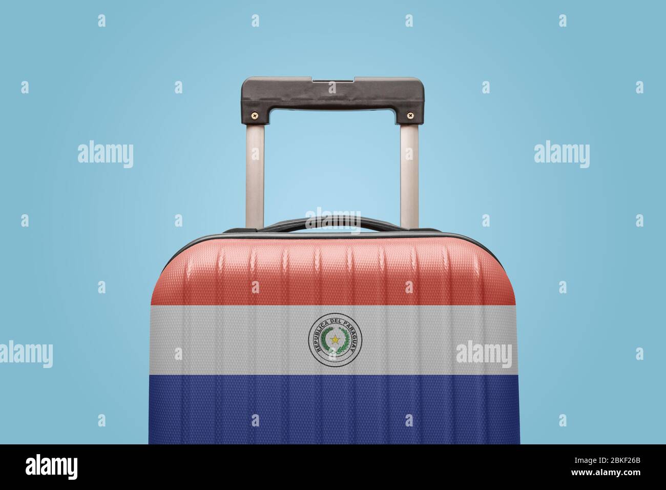 Suitcase with Paraguayan flag design travel South America concept. Stock Photo