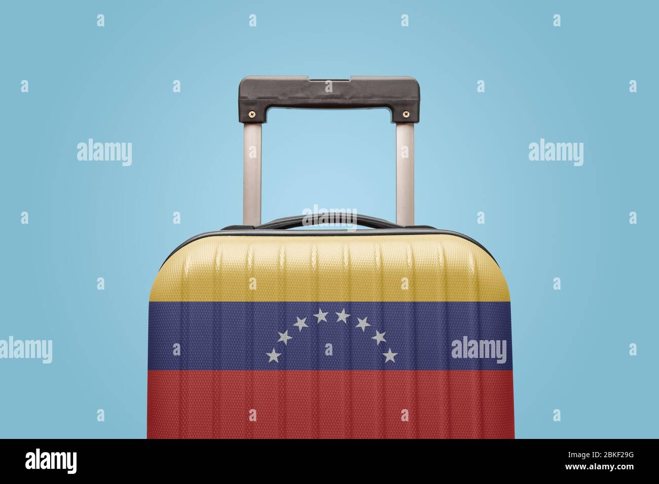 Suitcase with Venezuelan flag design travel South America concept. Stock Photo