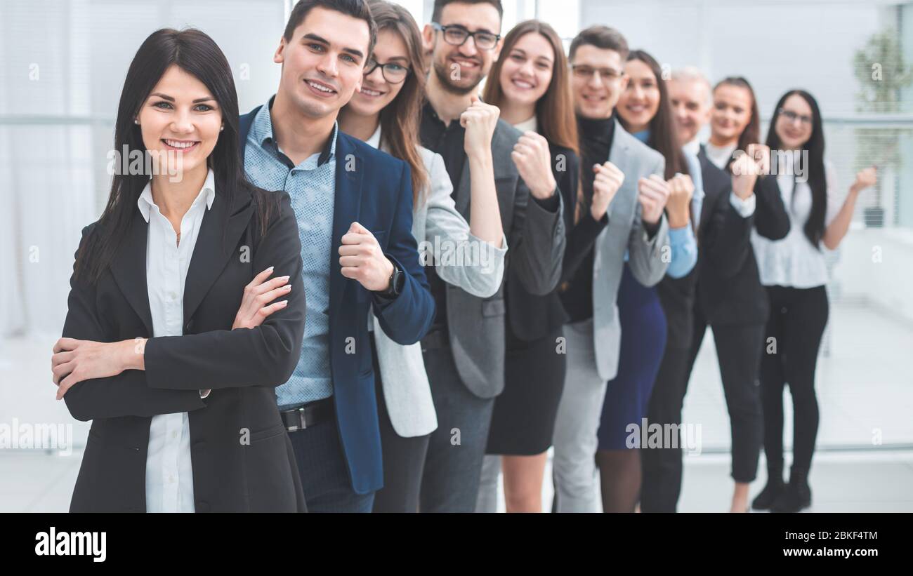group of happy young people standing in a row Stock Photo - Alamy