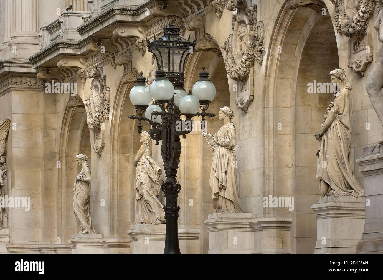 Lamp post and sculptures at the front of the Paris Opera,France, Ile-de-France, Paris. Place de l'Opéra. UNESCO World Heritage List, Charles Garnier, Stock Photo