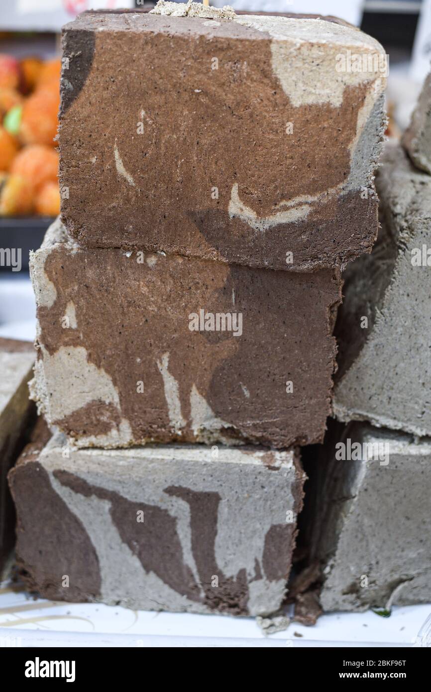 Sesame and tahina halva dessert with sesame paste and cacao stack for