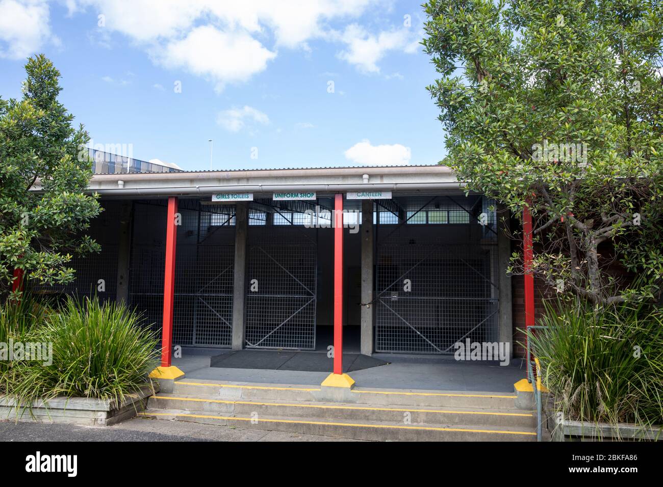 Sydney school with signs for uniform store shop canteen and girls