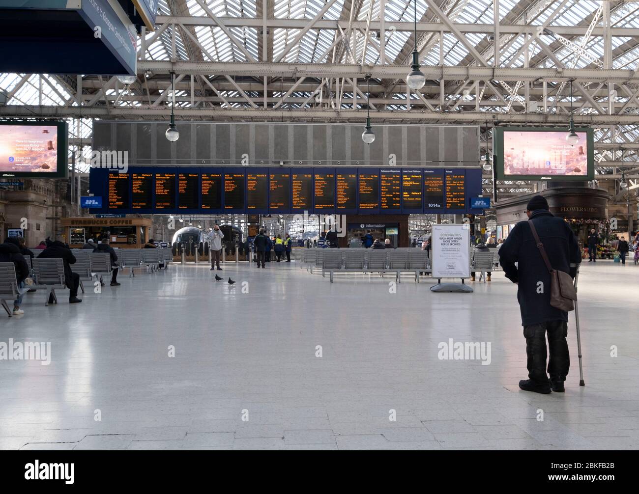 Government information sign in Glasgow's Central station during the Covid-19 lockdown. Stock Photo