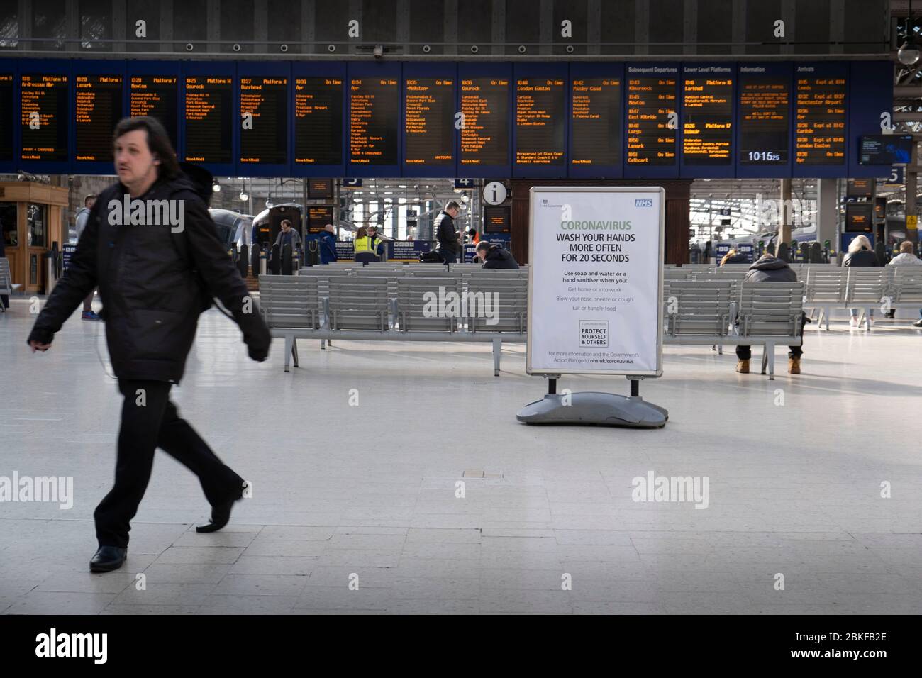 Government information sign in Glasgow's Central station during the Covid-19 lockdown. Stock Photo