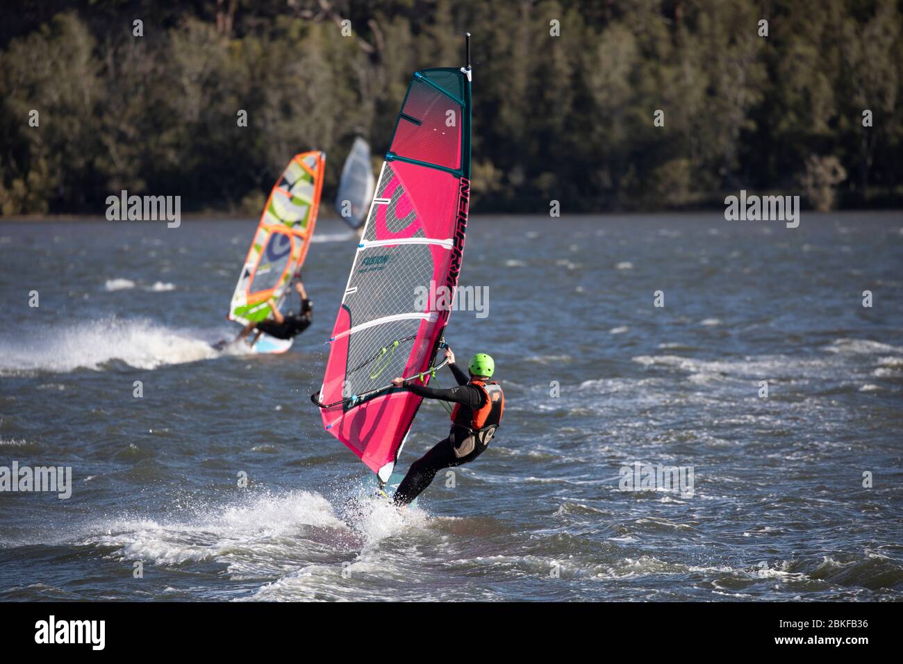 Australia windsurfing on narrabeen lake in Sydney on a windy autumn day