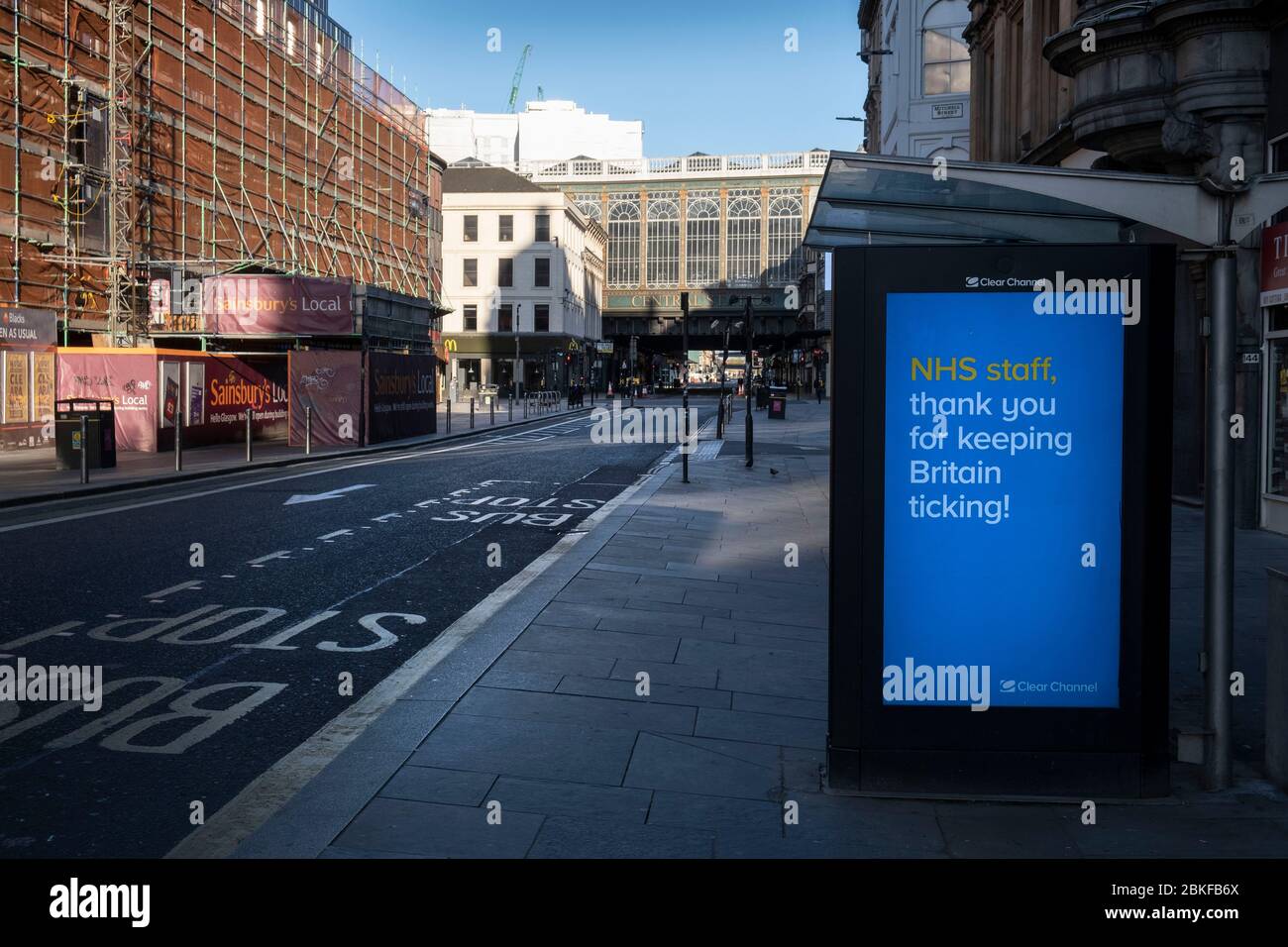 NHS sign on a bus shelter on Argyll Street in Glasgow during the Covid-19 lockdown. Stock Photo