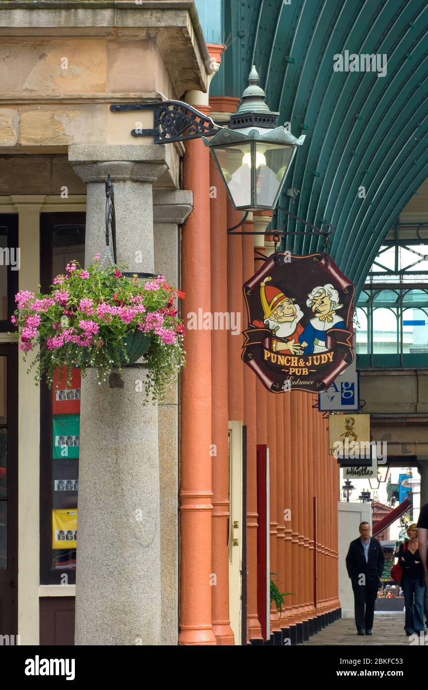 Punch and Judy sign and hanging basket, Covent Garden Market, London