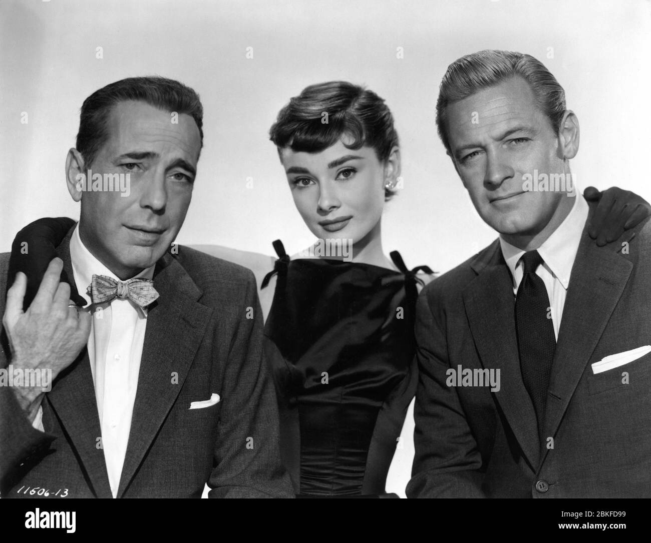 HUMPHREY BOGART AUDREY HEPBURN and WILLIAM HOLDEN Posed Publicity Portrait for SABRINA 1954 director BILLY WILDER Paramount Pictures Stock Photo