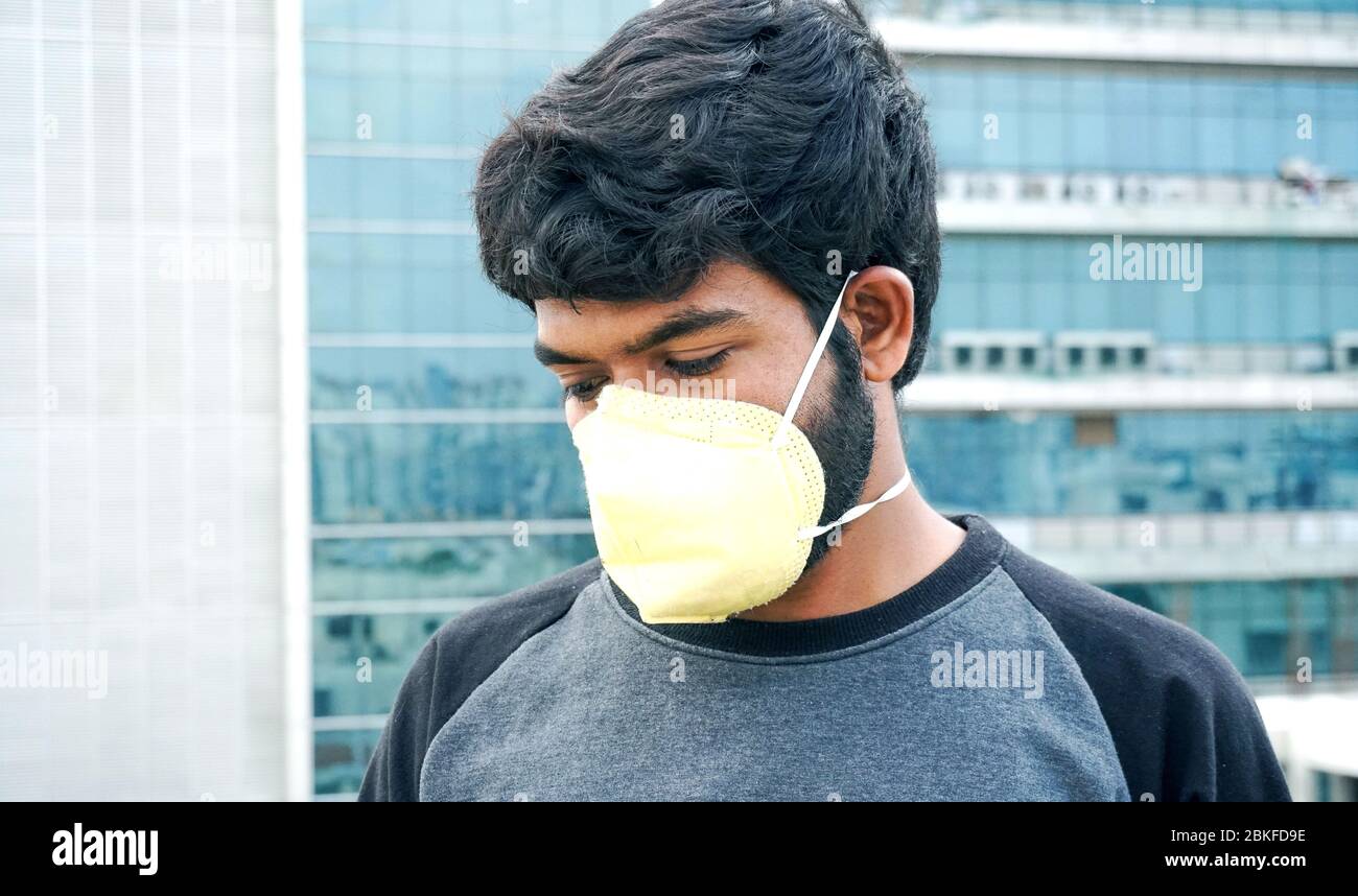 Download Indian Man In Yellow Protective Mask Stock Photo Alamy PSD Mockup Templates