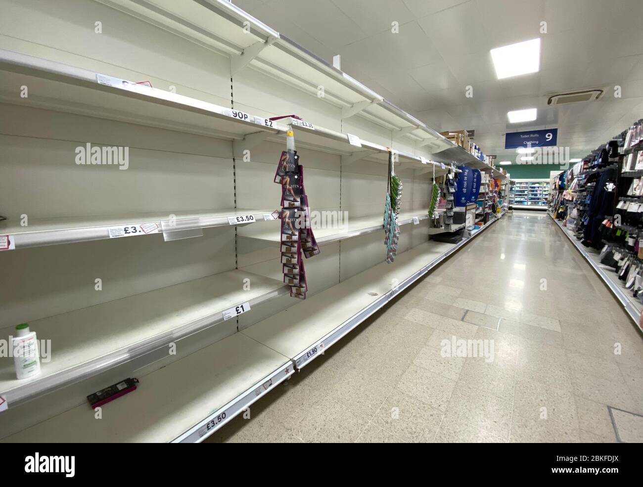 Empty supermarket shelves. Stock Photo
