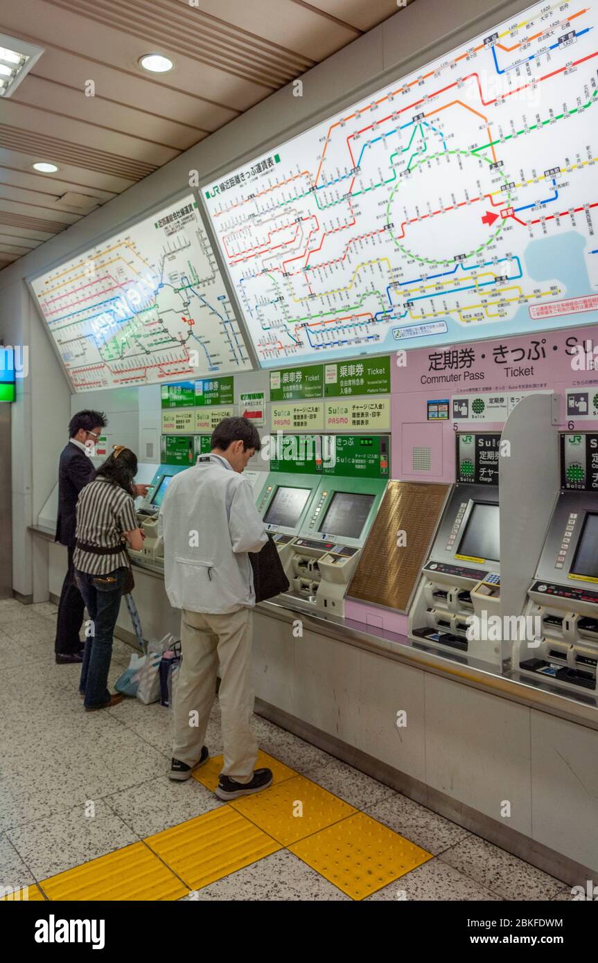 Buying tickets, Tokyo subway, Japan Stock Photo Alamy