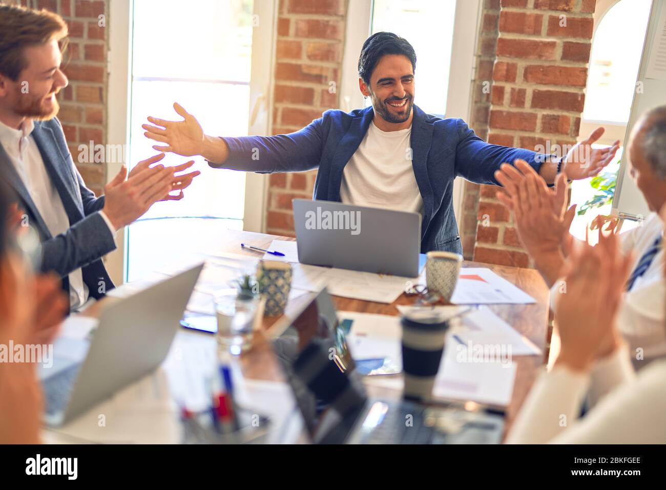 Working Smiling Group of business workers smiling happy and confident. Working together ...