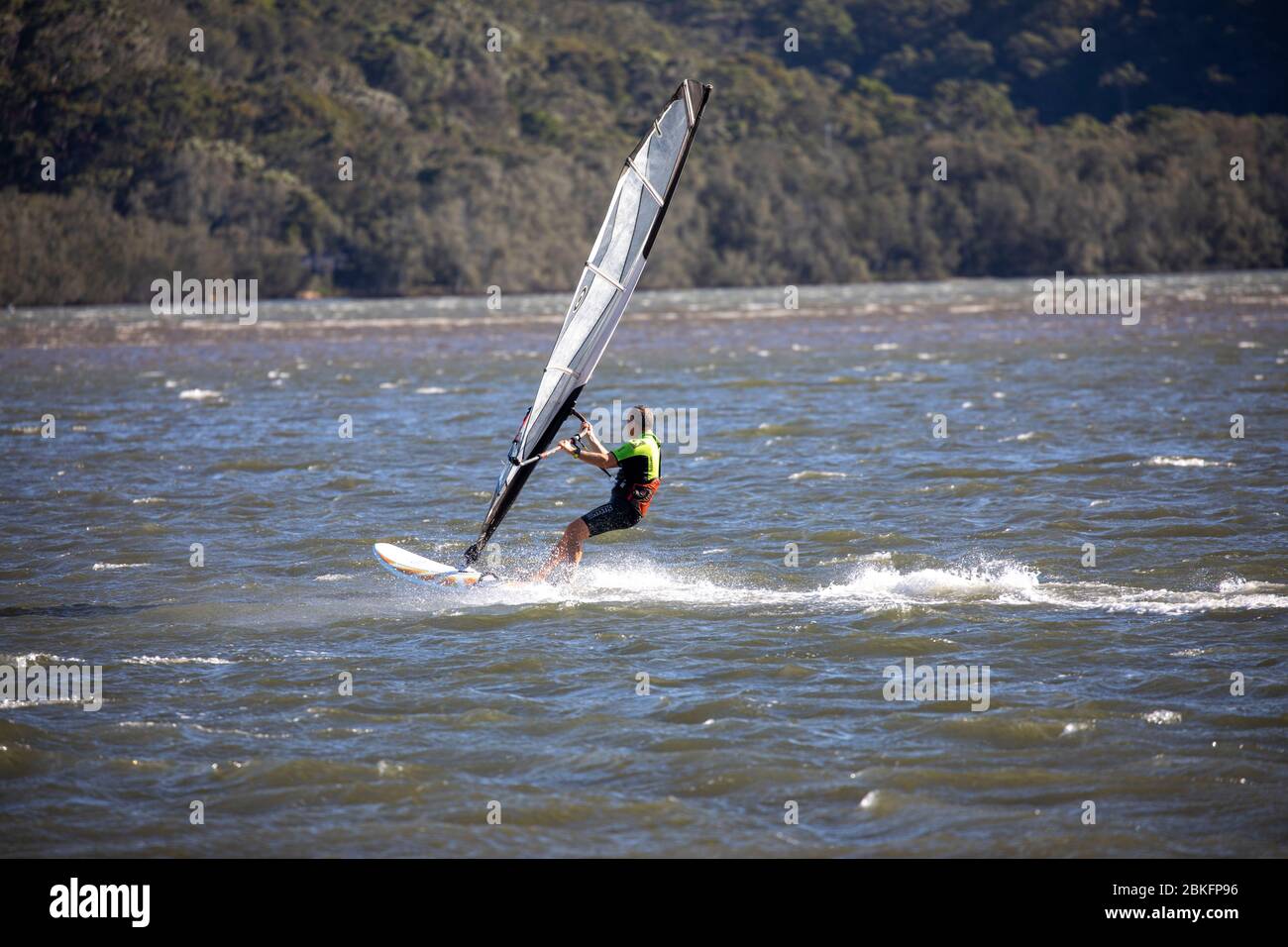 Windsurfing on Narrabeen lake in North Sydney New South Wales,Australia