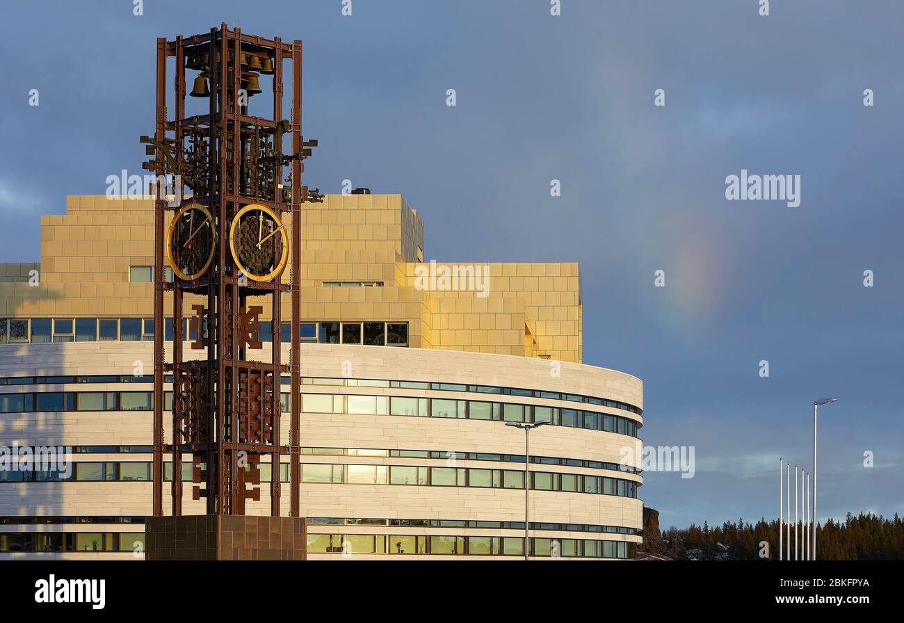 Exterior facade with clock tower. Kristallen Kiruna, Kiruna, Sweden. Architect: Henning Larsen, 2018. Stock Photo