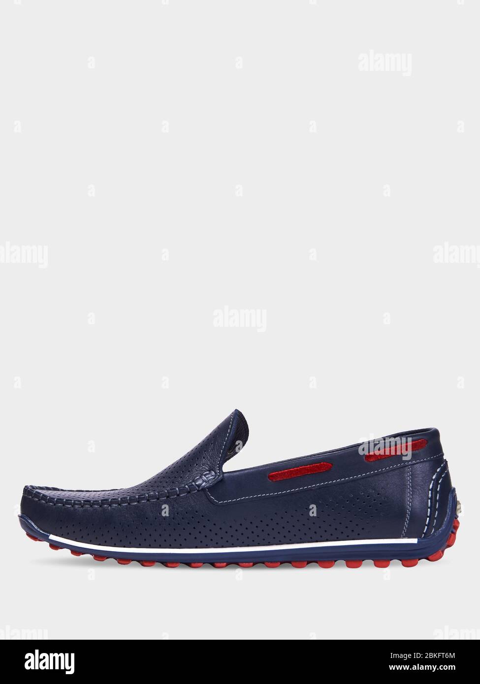Men s leather summer loafers in blue with elastic red sole. Isolated on a white background Stock Photo Alamy