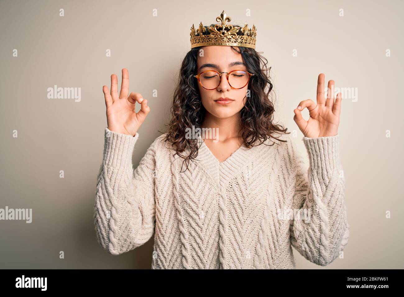 Princess wearing golden crown glasses hi-res stock photography and ...