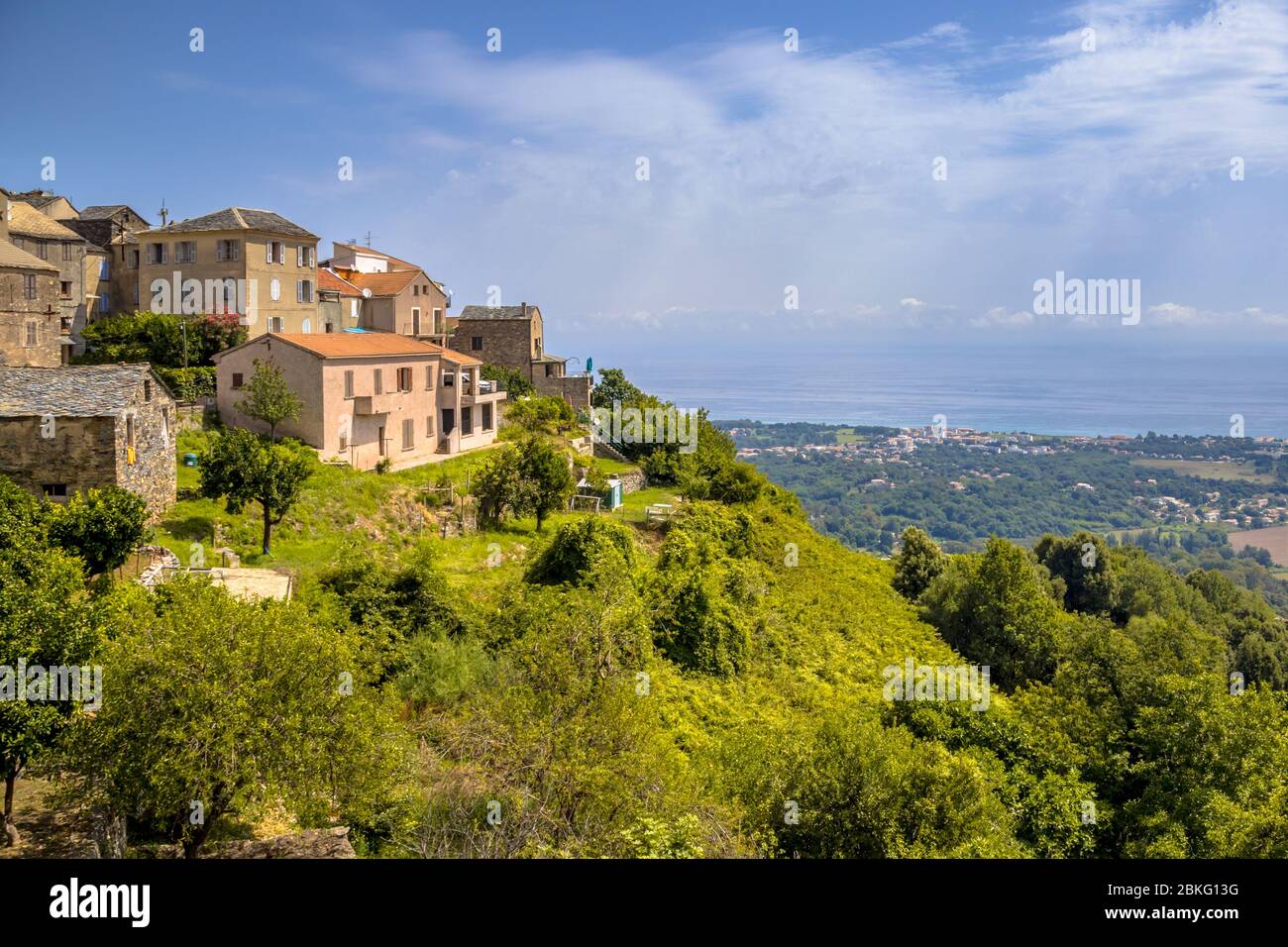 Mountain Village of San-nicolao with view over the mediteranean sea on Corsica, France Stock Photo