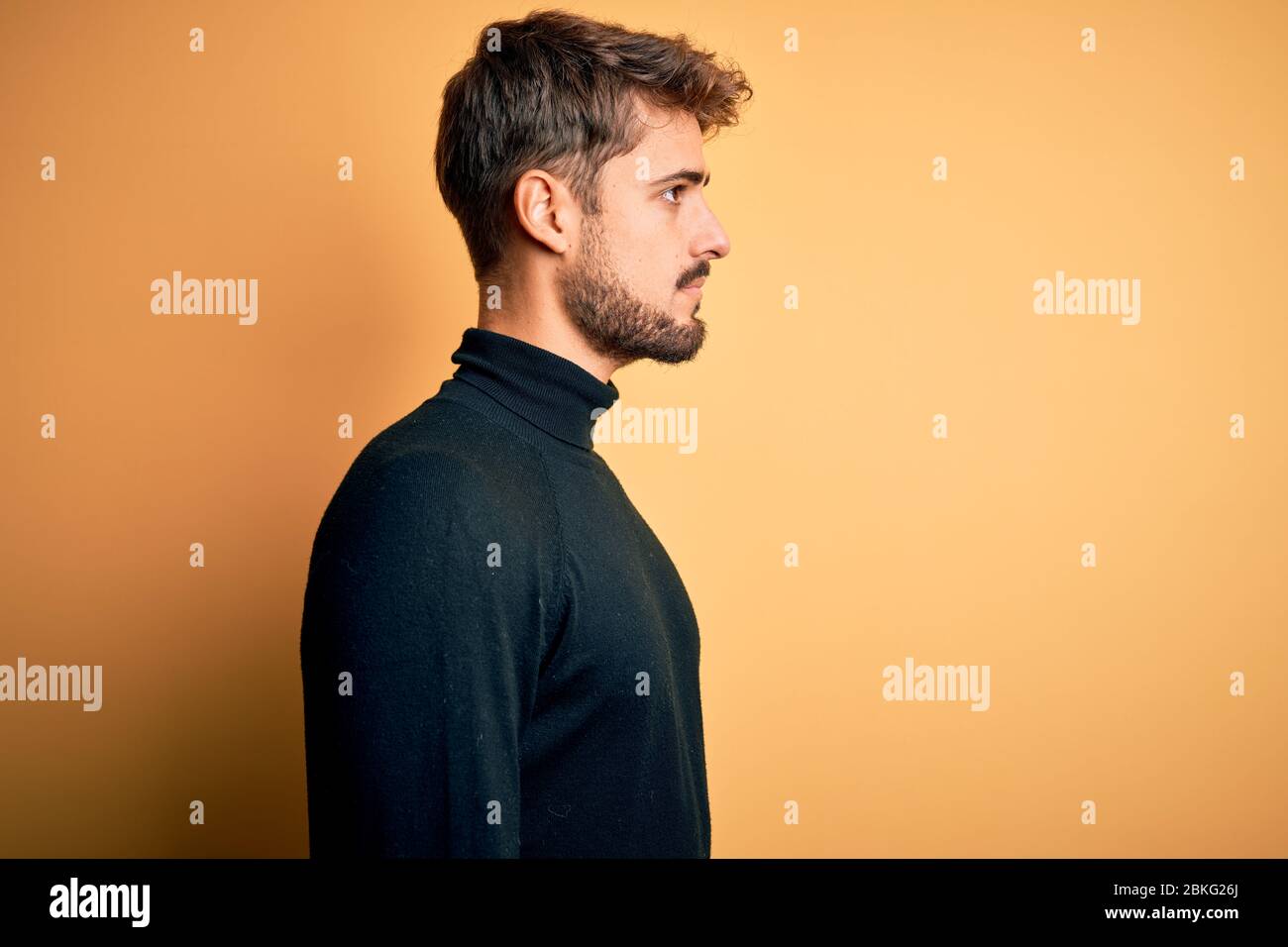 A man with a goatee and a turtle neck sweater photo – Man face