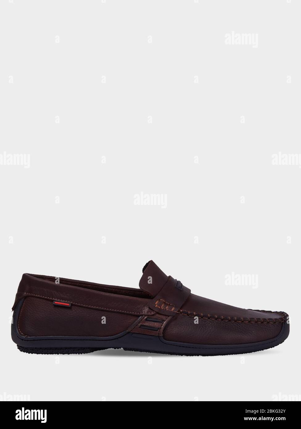 Men's brown leather summer loafers with black sole. Isolated on a white  background Stock Photo - Alamy