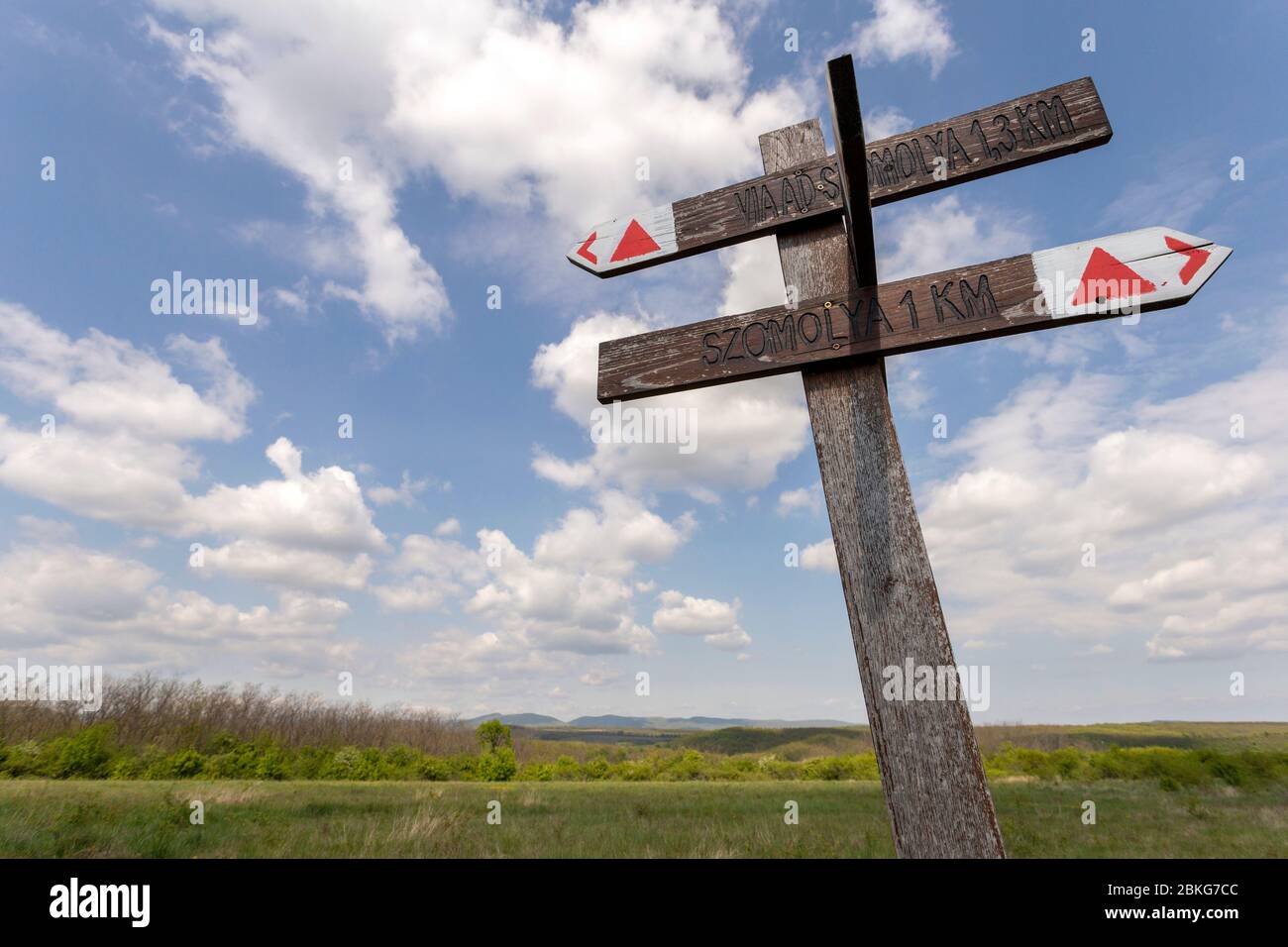 Wood signpost in the Bukk mountains for hikers near Szomolya, Hungary Stock Photo