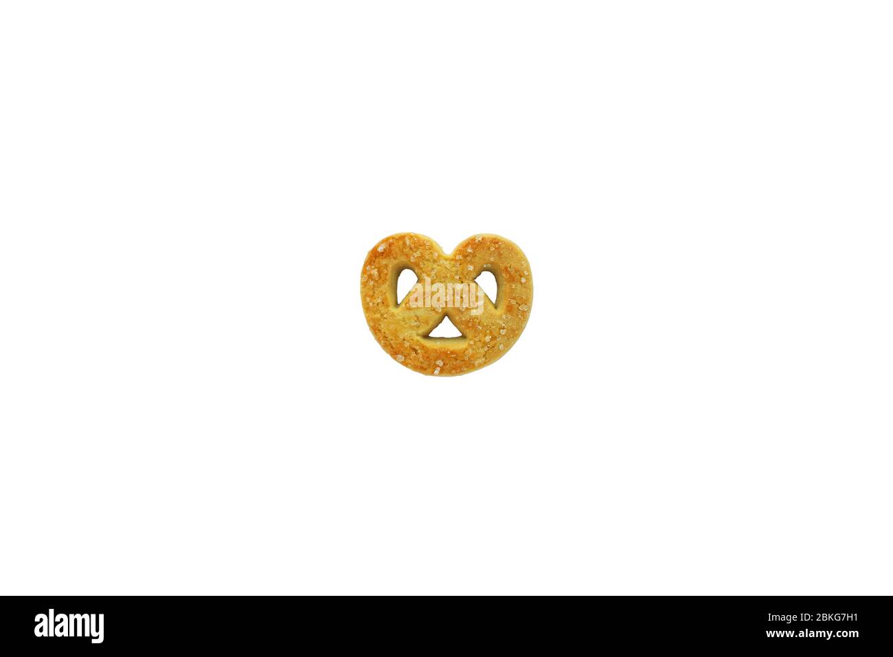 pretzel shaped butter cookie sprinkled with sugar isolated on white