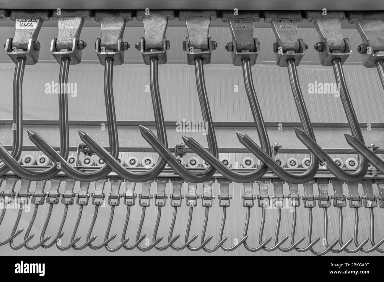 Meat hanging hook.Industrial loading dock area inside cold storage