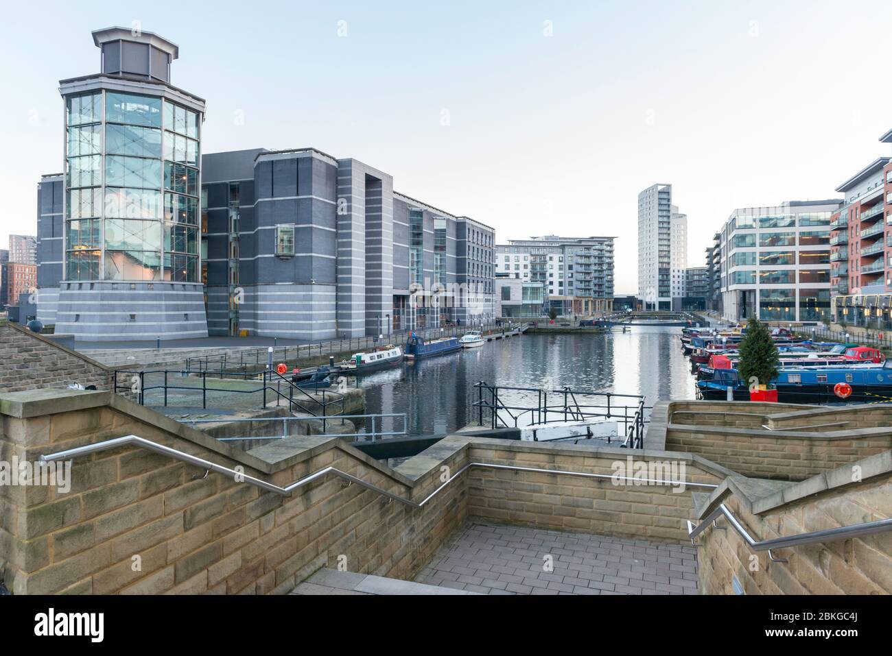 The historic Leeds Dock, a mixed redevelopment with the Royal Armouries museum, offices, apartments and retail near the centre of the city of Leeds Stock Photo