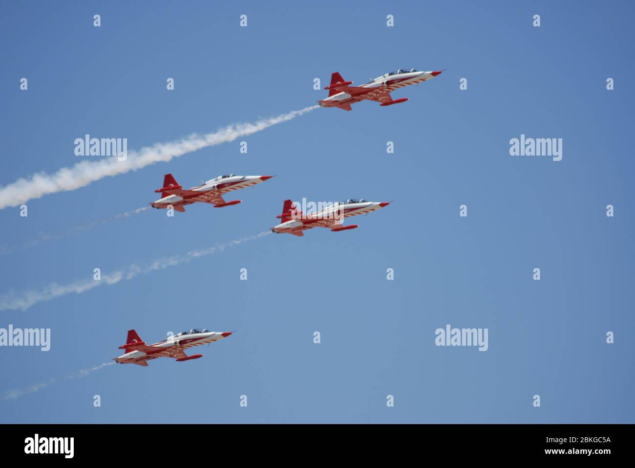 NF-5A aircrafts of the the Turkish Stars aerobatic display team fly over the air base during the Anatolian Eagle military exercise in Konya Stock Photo