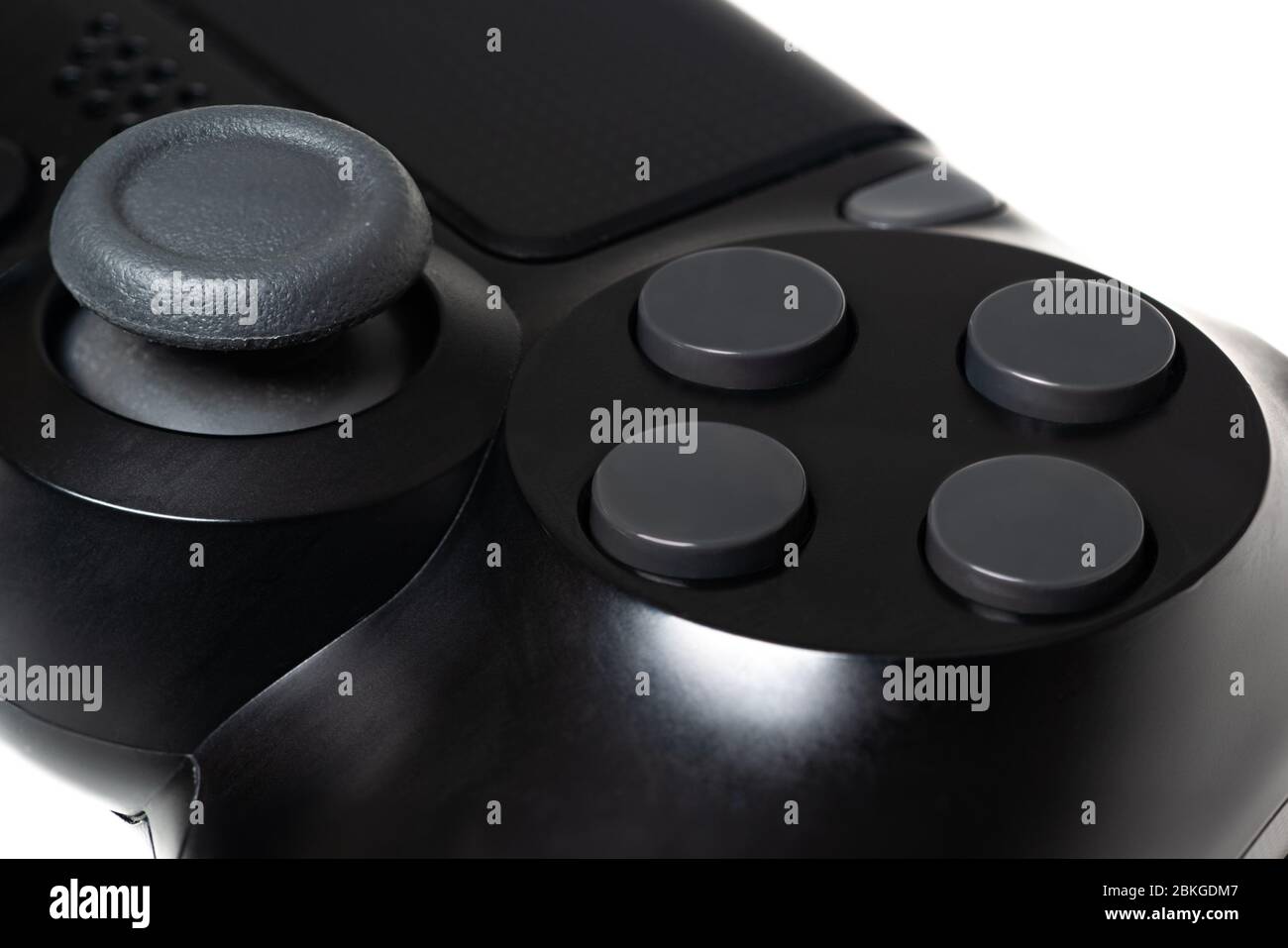 Black video game controller closeup white background Stock Photo