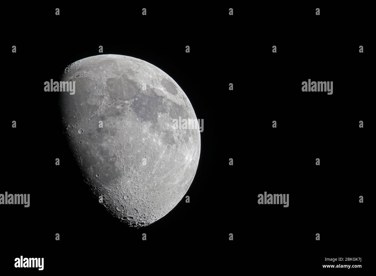 Waxing Gibbous lunar phase as seen from the Northern Hemisphere witht the moon set against a