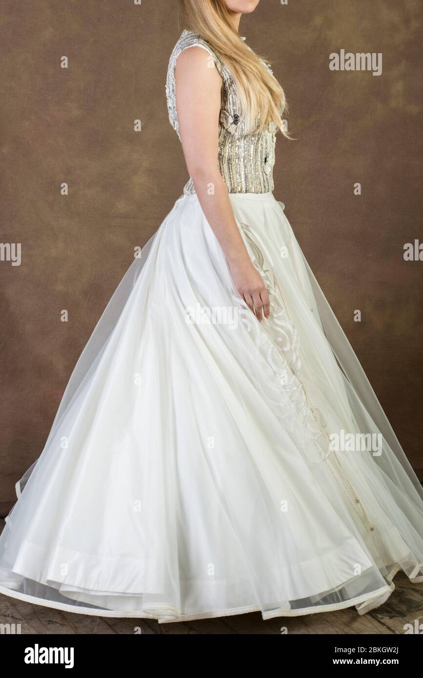 Woman wearing bridal dress Stock Photo