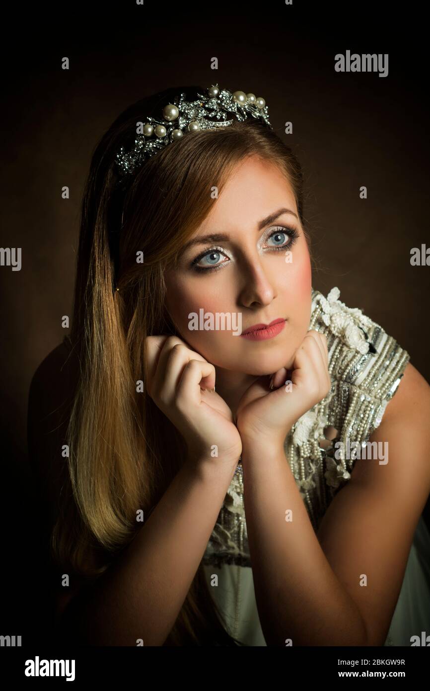 Beautiful pensive woman looking away Stock Photo