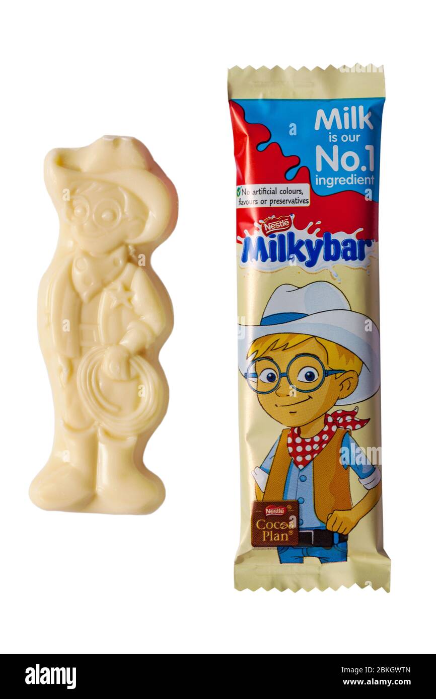 Milkybar small bar of white chocolate wrapped & unwrapped showing Milky bar Kid from Nestle Milky bar selection pack isolated on white background Stock Photo