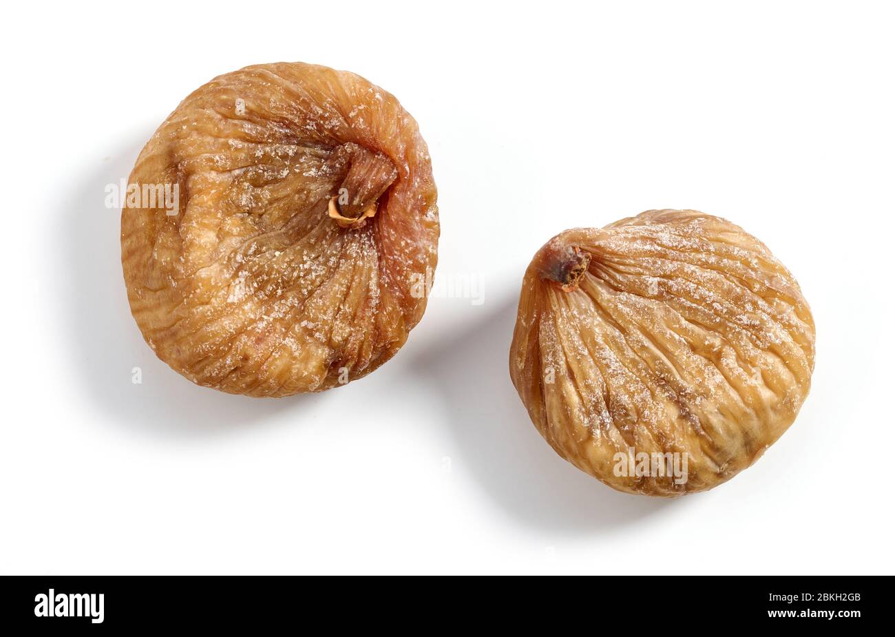 two dried figs isolated on white background, top view Stock Photo