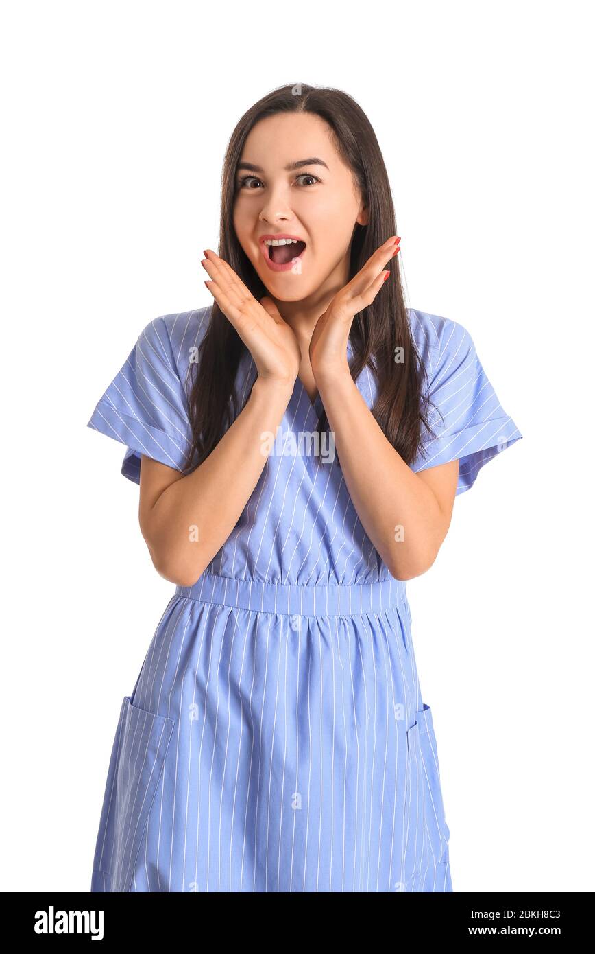 Portrait of surprised young woman on white background Stock Photo - Alamy