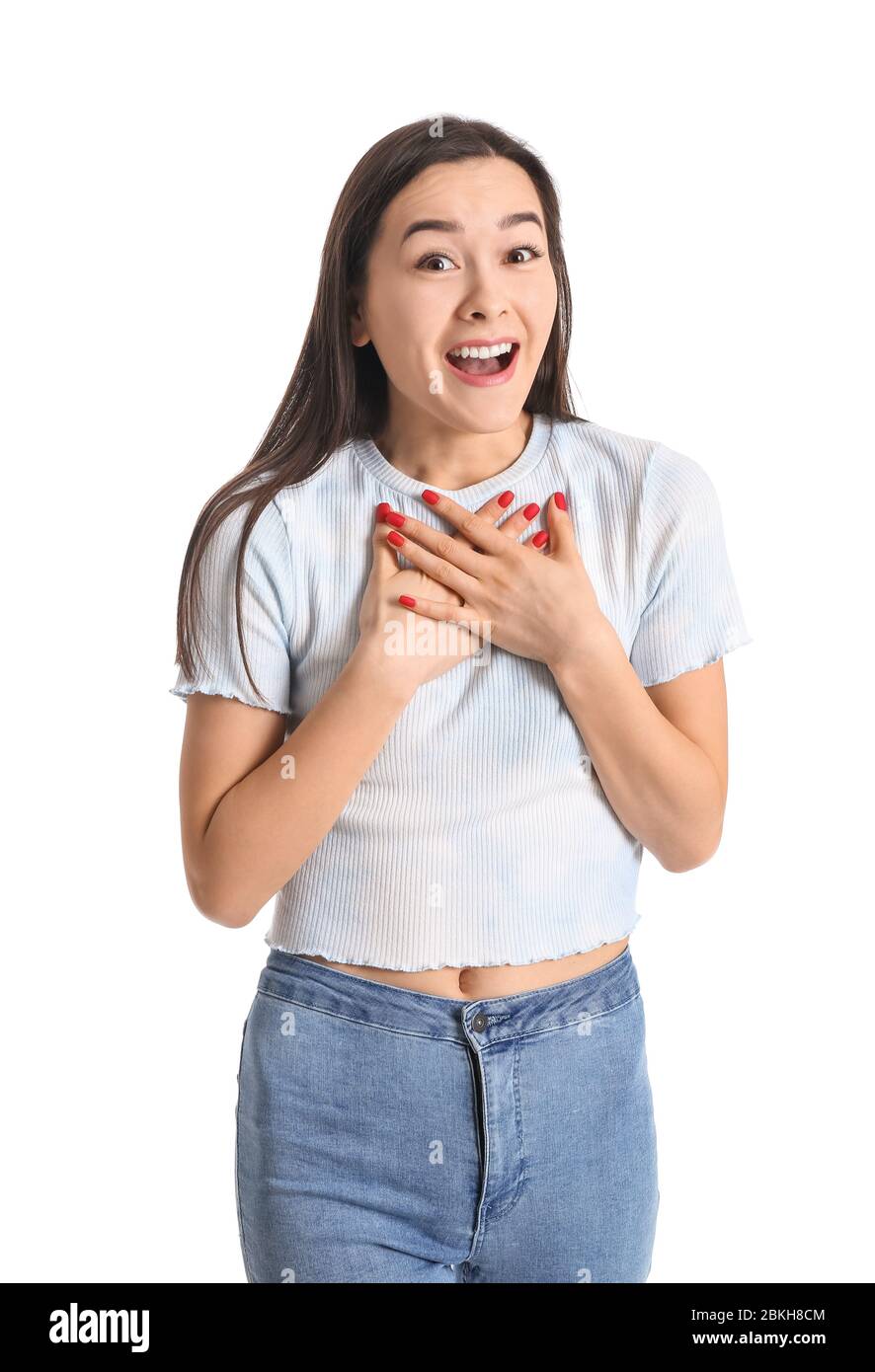 Portrait of surprised young woman on white background Stock Photo - Alamy