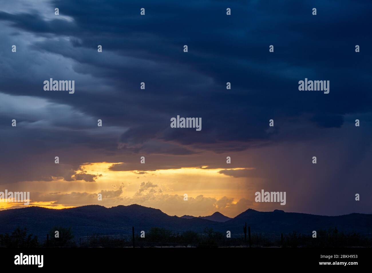 A sunset image of a monsoon in the Sonoran desert of Arizona. Stock Photo