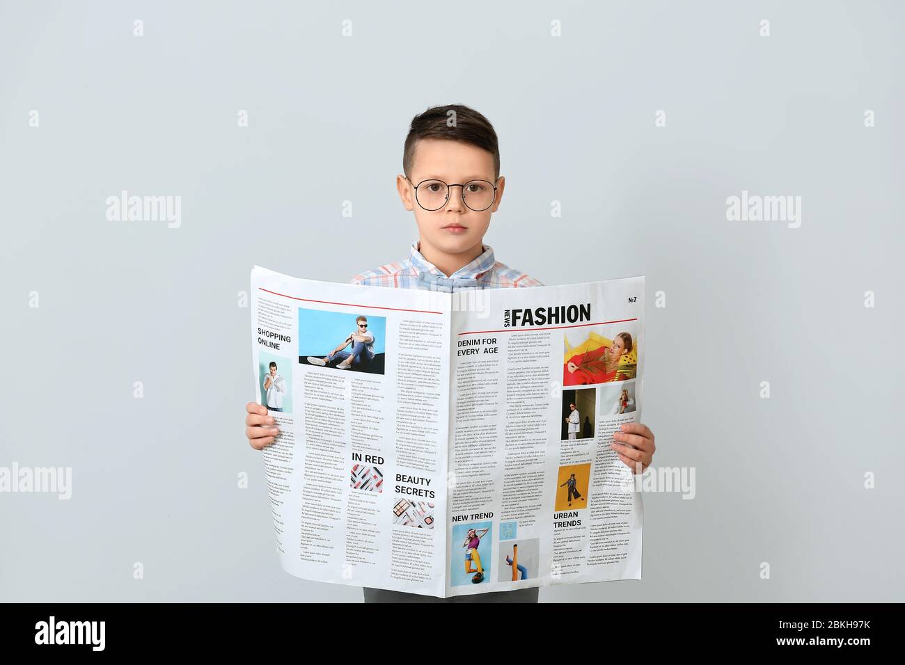 Cute Little Boy With Newspaper On Light Background Stock Photo Alamy Cute Little Boy With Newspaper On Light Background Stock Photo Alamy