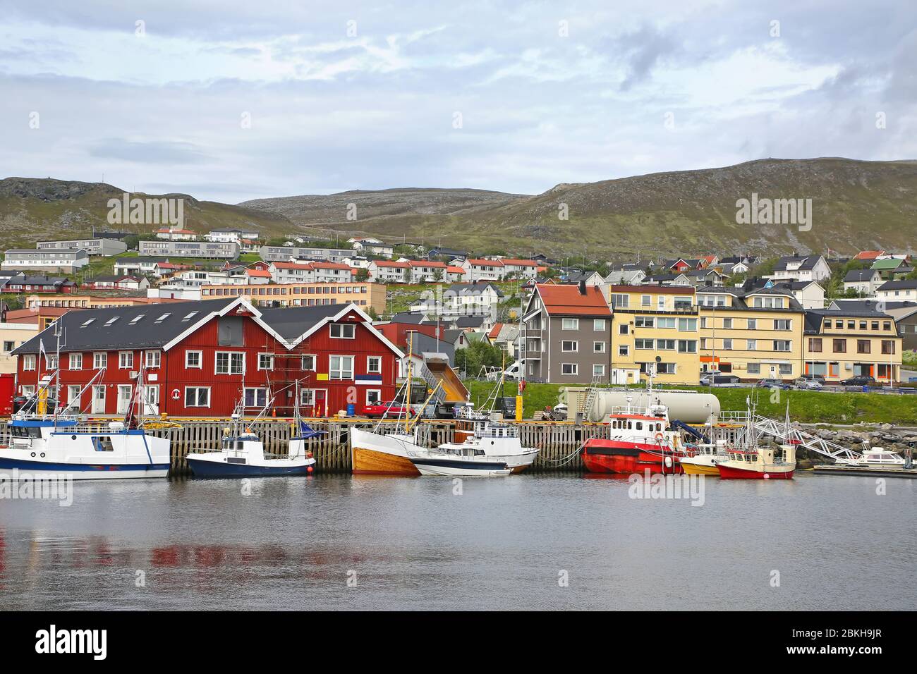 Port and habour with fishing boats in the northernmost town in the world with more than 10,000 inhabitants, Hammerfest, Norway. Stock Photo