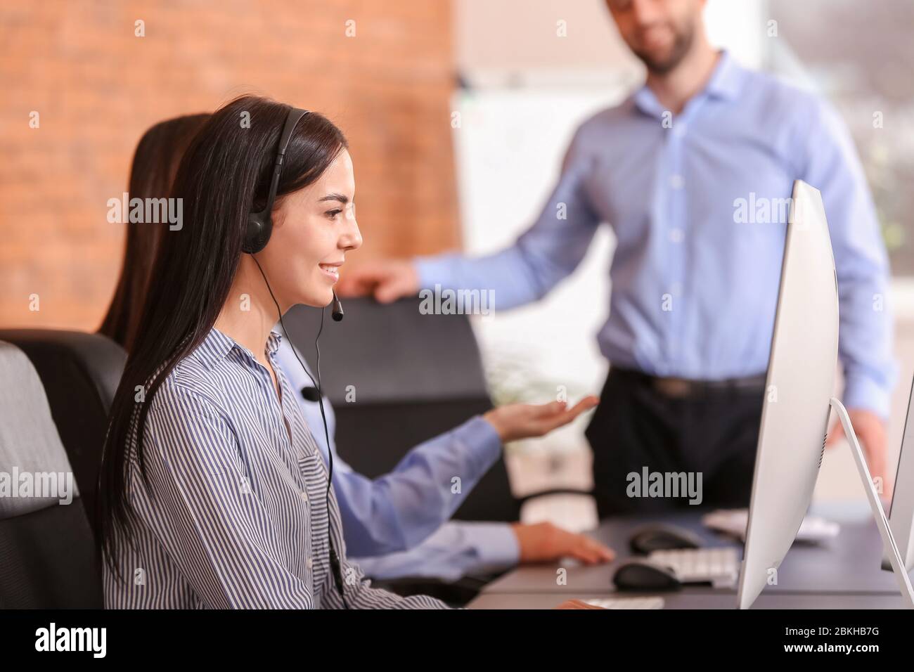 Female technical support specialist working hi-res stock photography ...