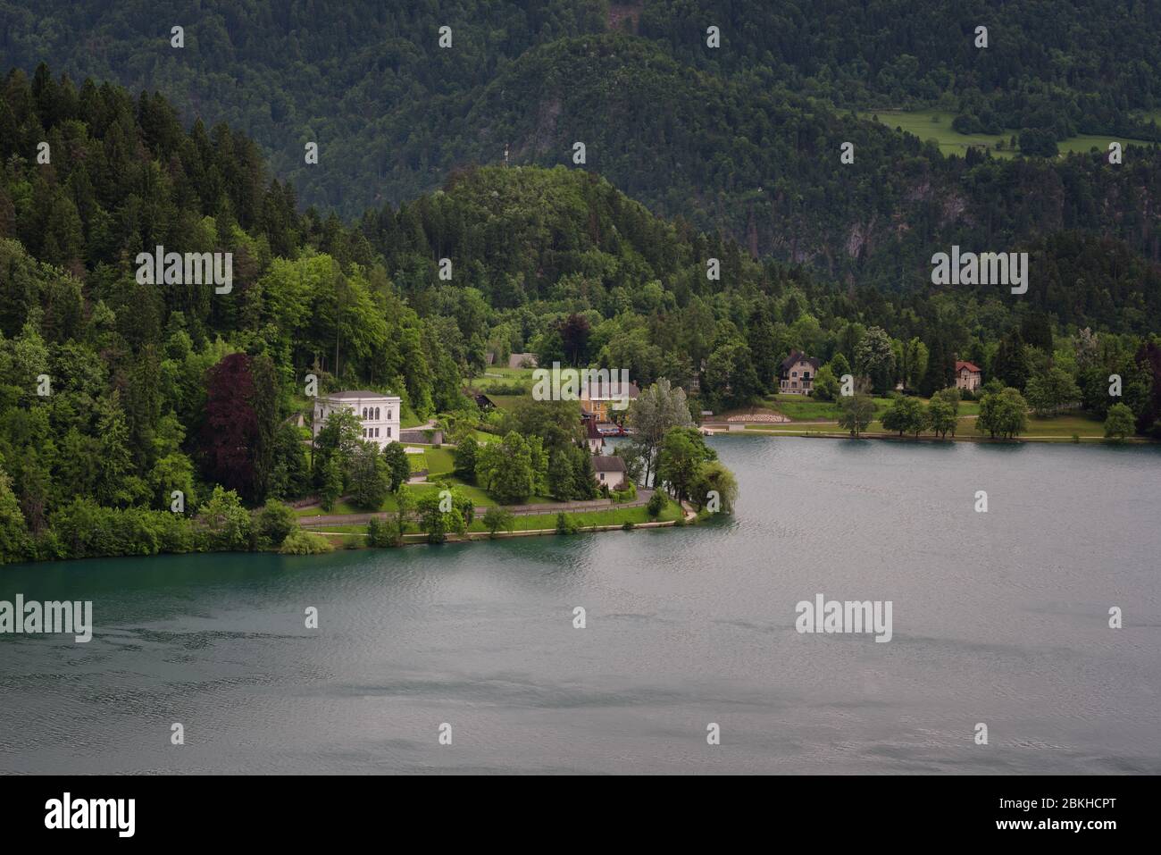 Bled Lake, shoreline mountain, alpine village in sunny weather, Slovenia, Europe. Stock Photo