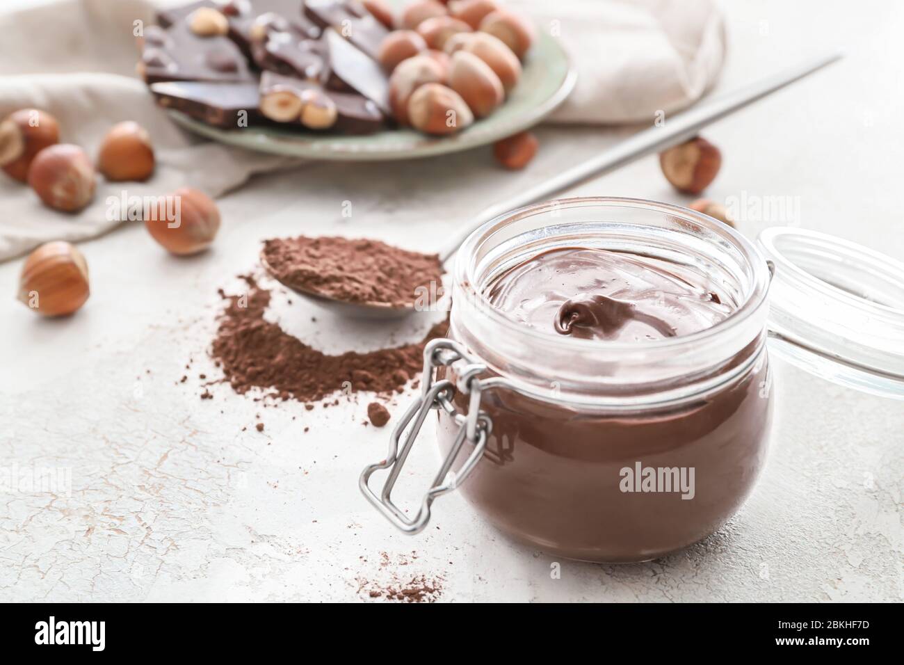 Download Jar With Tasty Chocolate Paste On Light Background Stock Photo Alamy PSD Mockup Templates