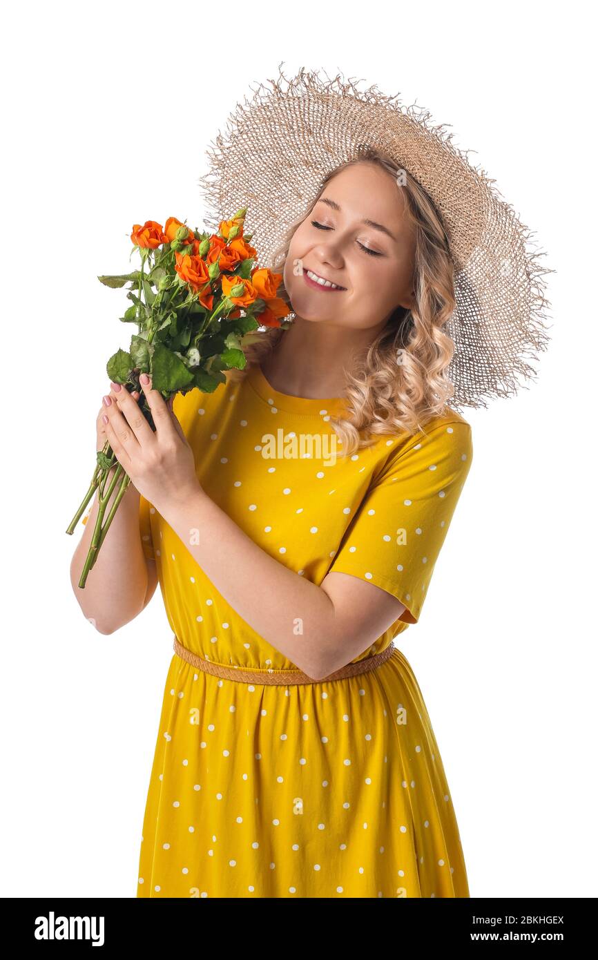 Beautiful young woman with bouquet of flowers on white background Stock ...