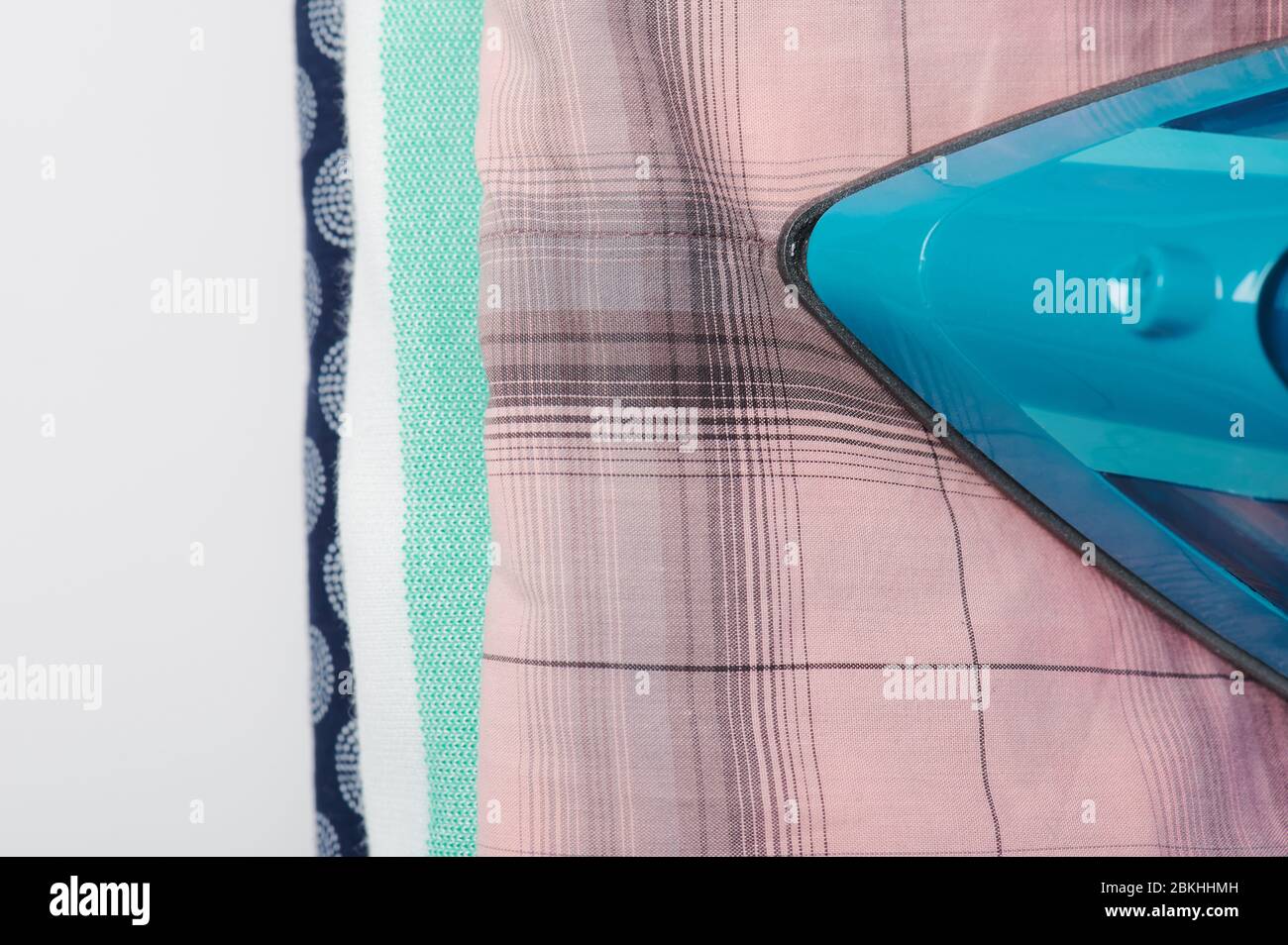 Ironing colorful cloth above top view isolated Stock Photo