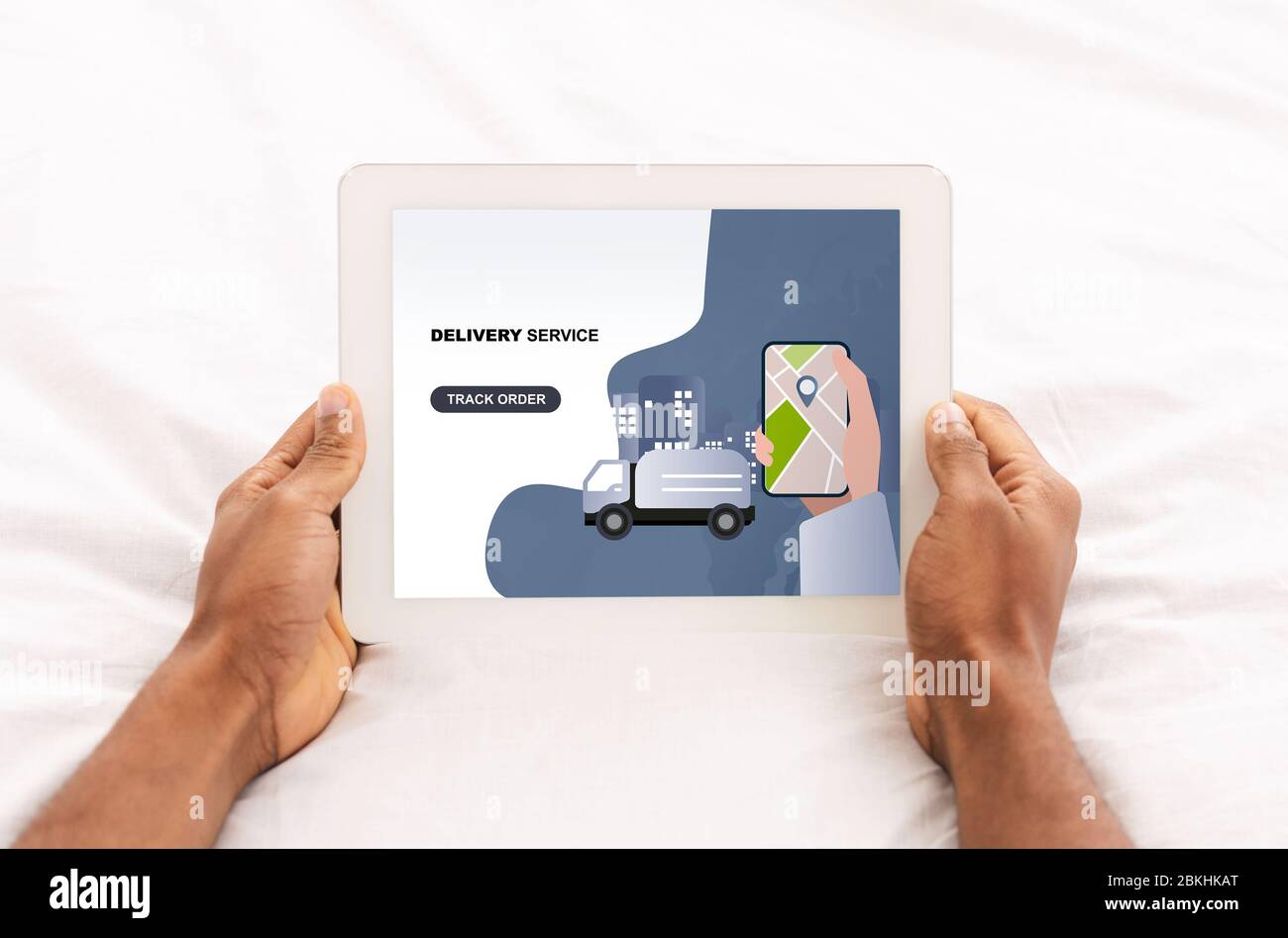 Big digital tablet with online delivery service app Stock Photo - Alamy