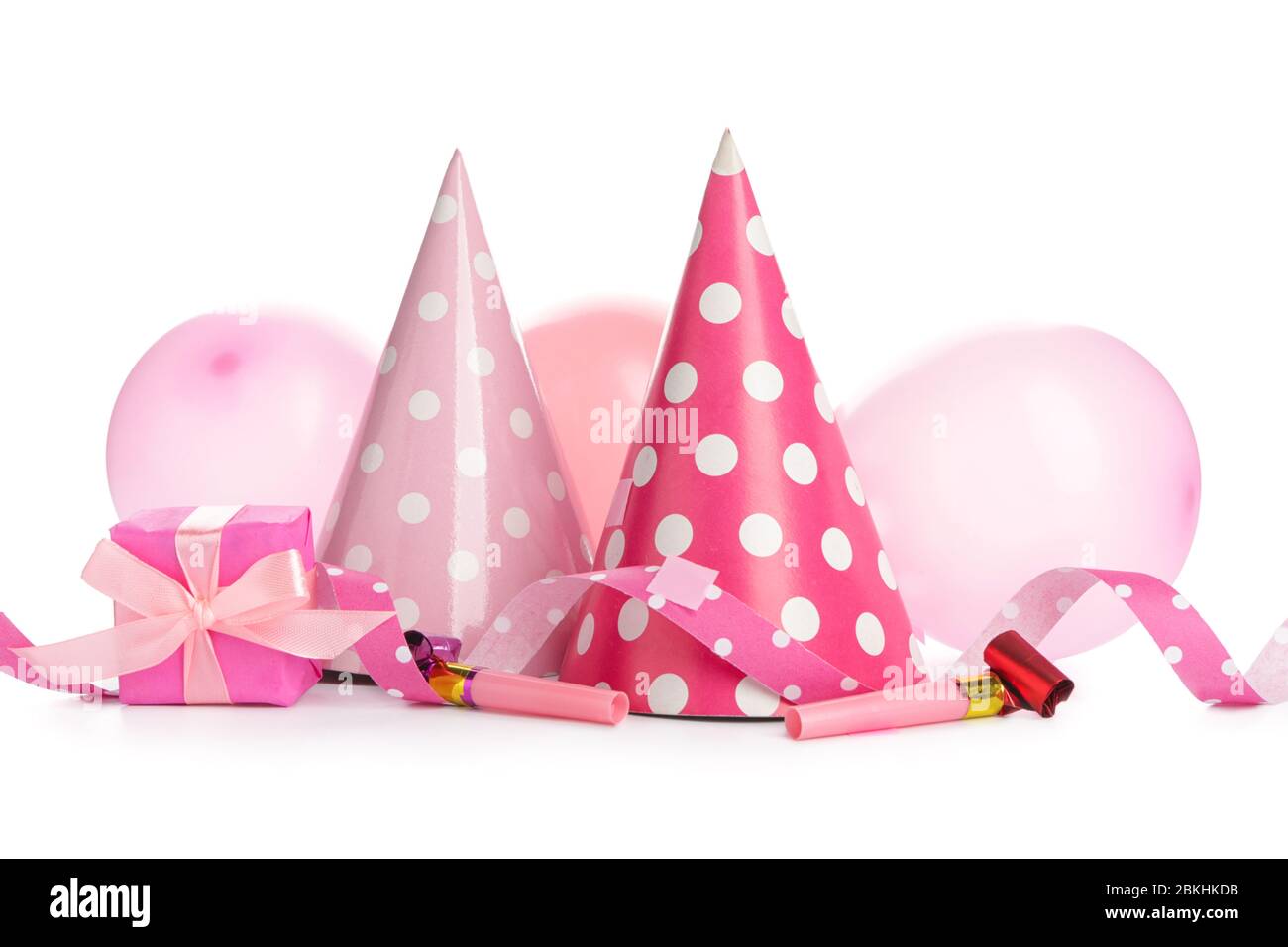 Party hats and decor on white background Stock Photo - Alamy