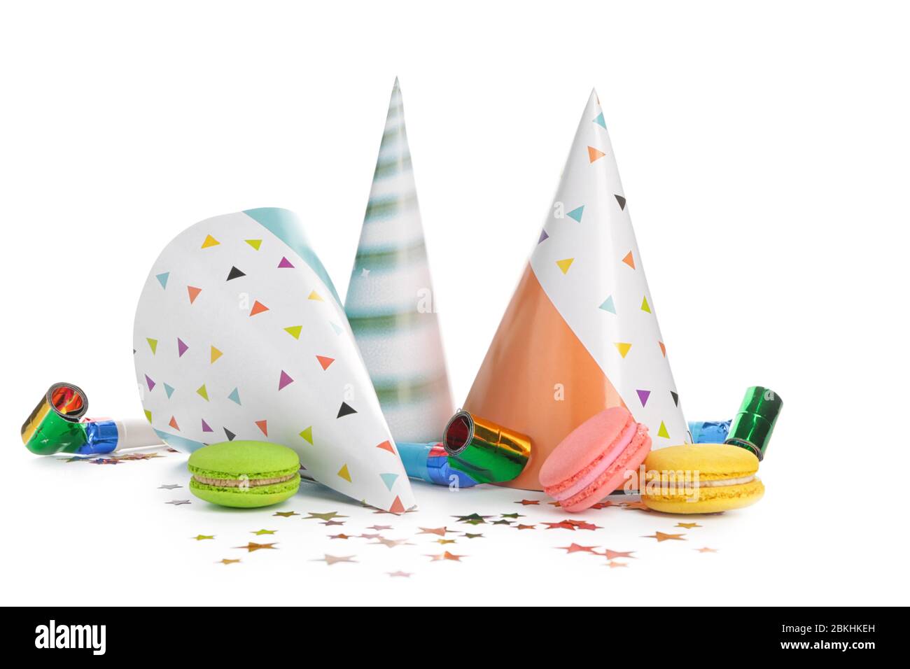 Party hats and decor on white background Stock Photo - Alamy