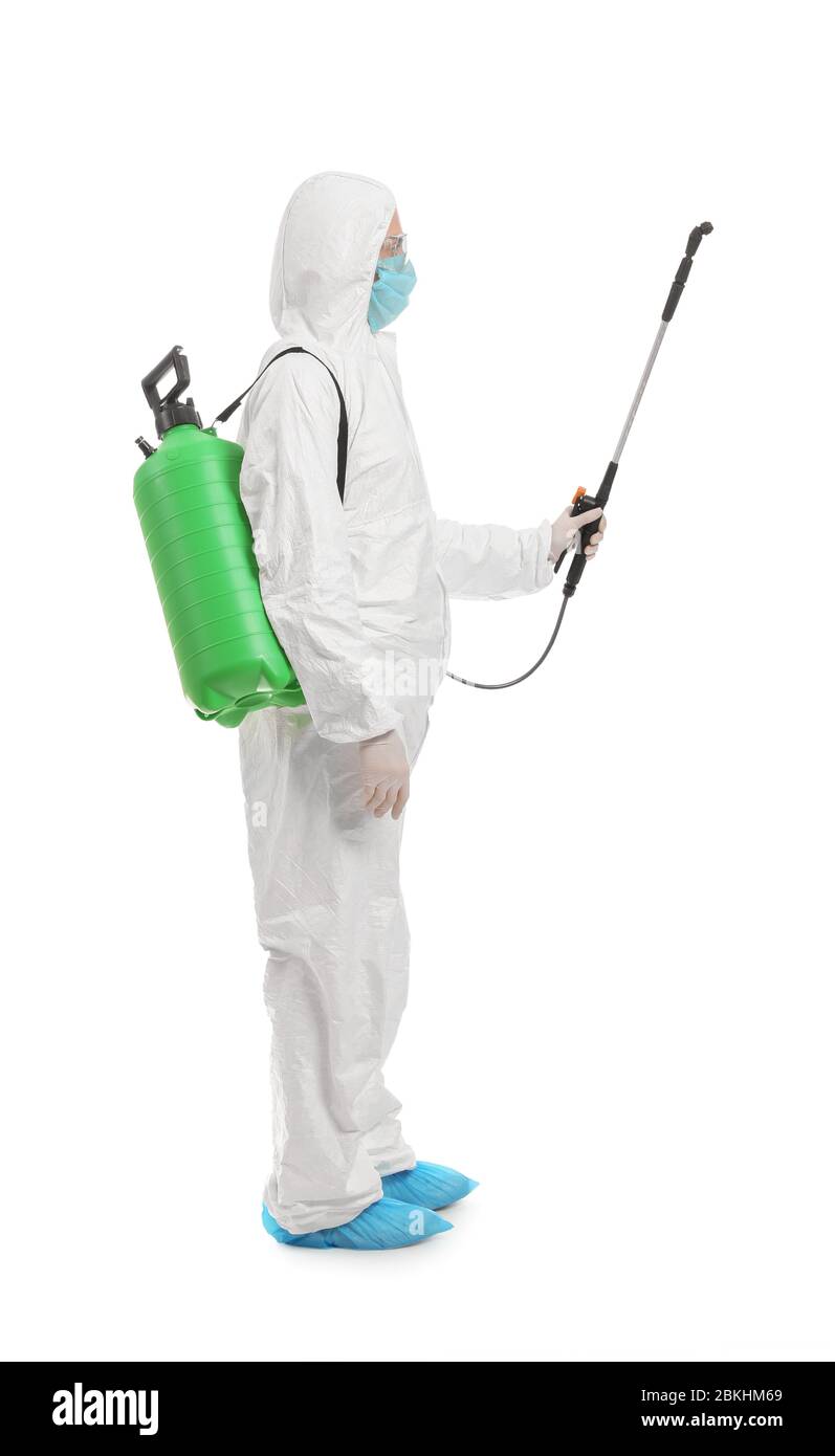 Worker in biohazard suit and with disinfectant on white background Stock Photo