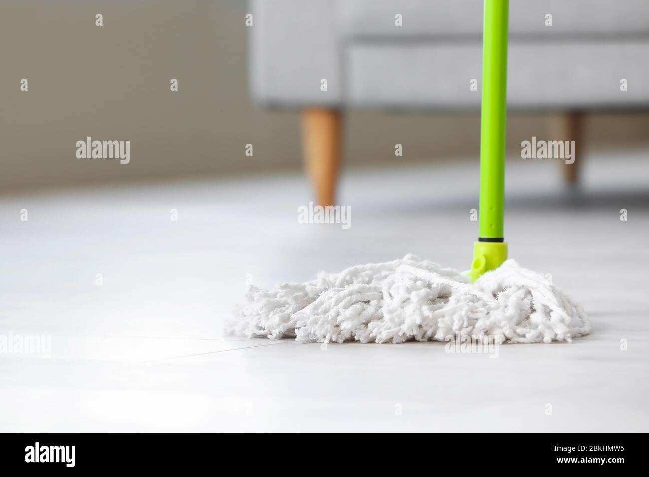 Mopping of floor in room Stock Photo