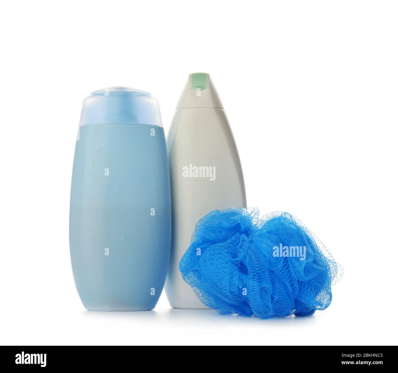 Shower gels and loofah on white background Stock Photo Alamy